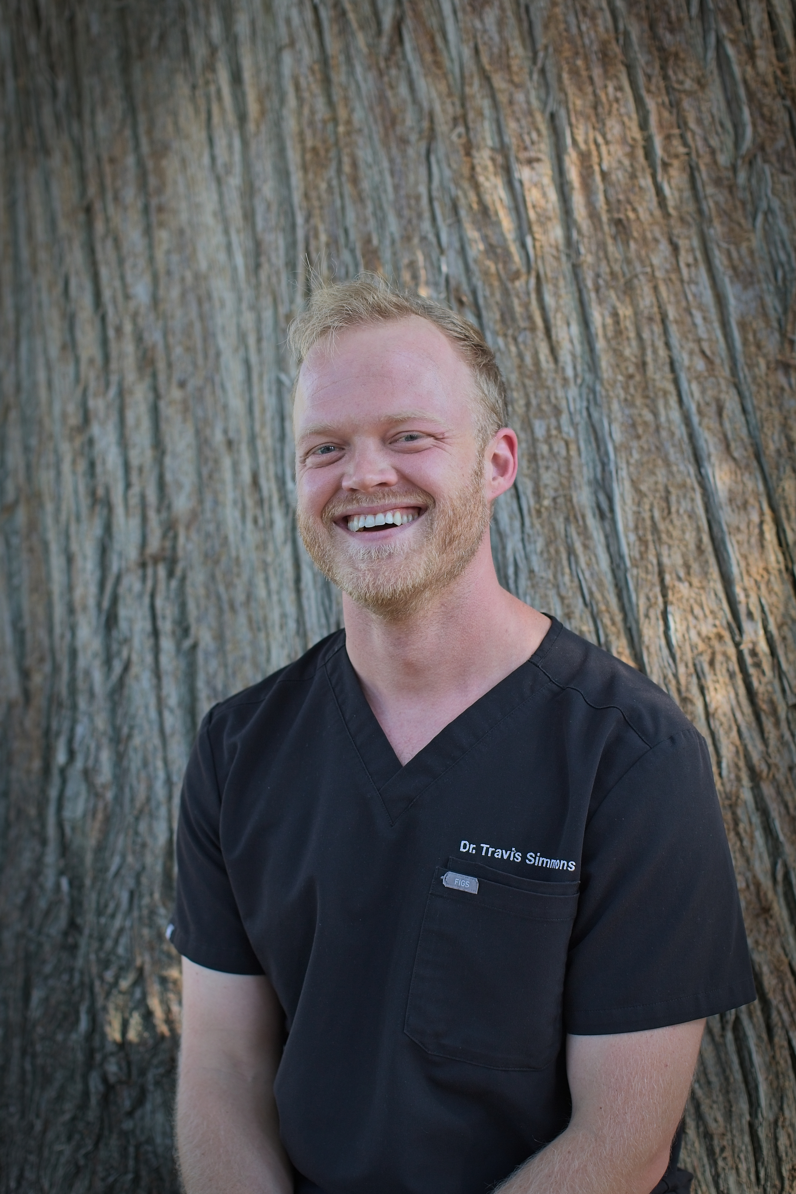 Travis Simmons, MD, Associate Medical Director